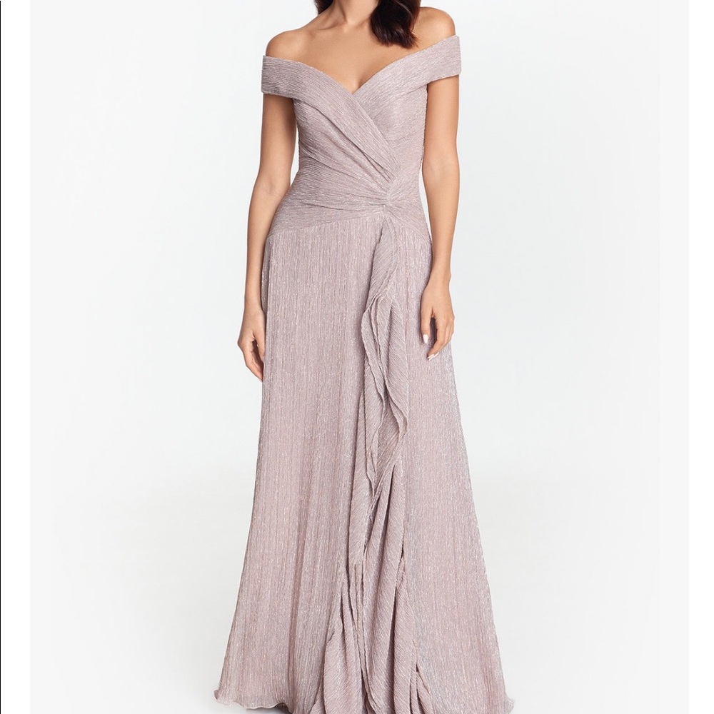 Shimmer from shoulder to toe in this ultra-glam gown by XSCAPE.